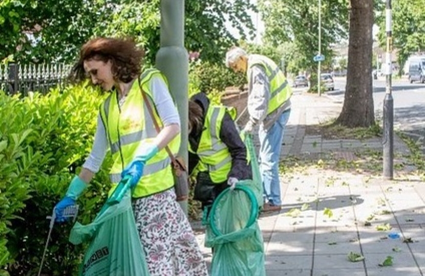 Theresa Villiers takes part in volunteer litter pick