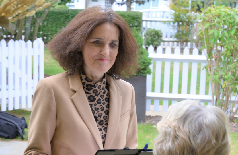 Theresa Villiers MP doing doorstep calls on constituents in Hadley Highstone