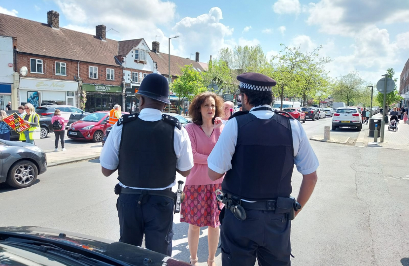 Theresa Villiers chats to neighbourhood police officers in New Barnet