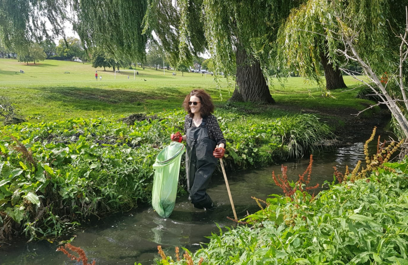 Theresa Villiers joins a volunteer group cleaning up Pymmes Brook