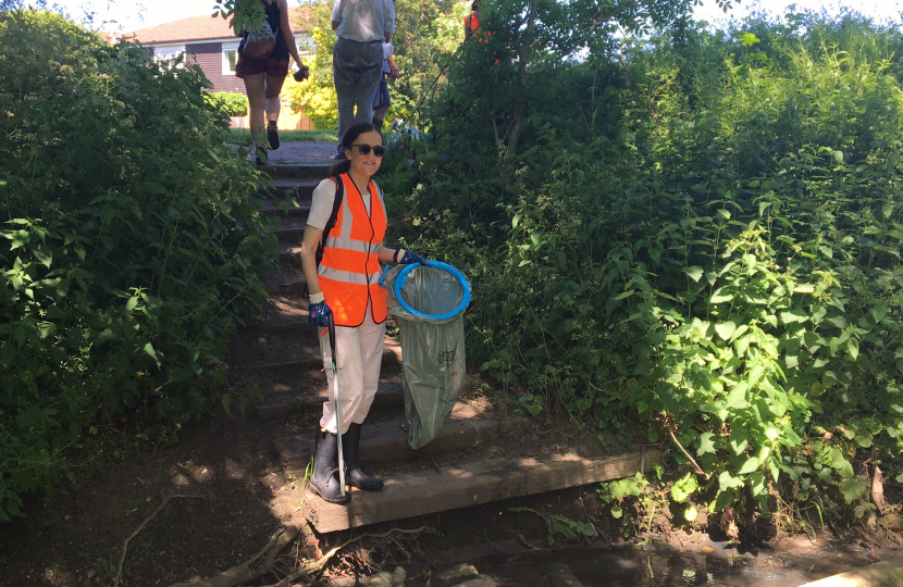 Theresa Villiers helping with a litter-pick by Dollis Brook