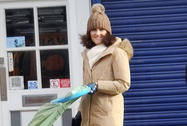 Theresa Villiers taking part in a volunteer litter-pick