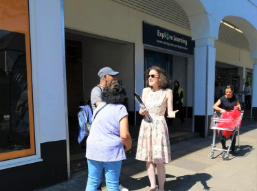 Theresa Villiers carrying out a street surgery outside Sainsbury's in New Barnet
