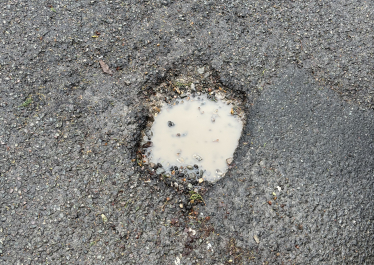Pothole in Wood Street in Barnet